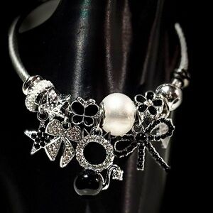 Elegant Black and Silver Charm Bracelet
